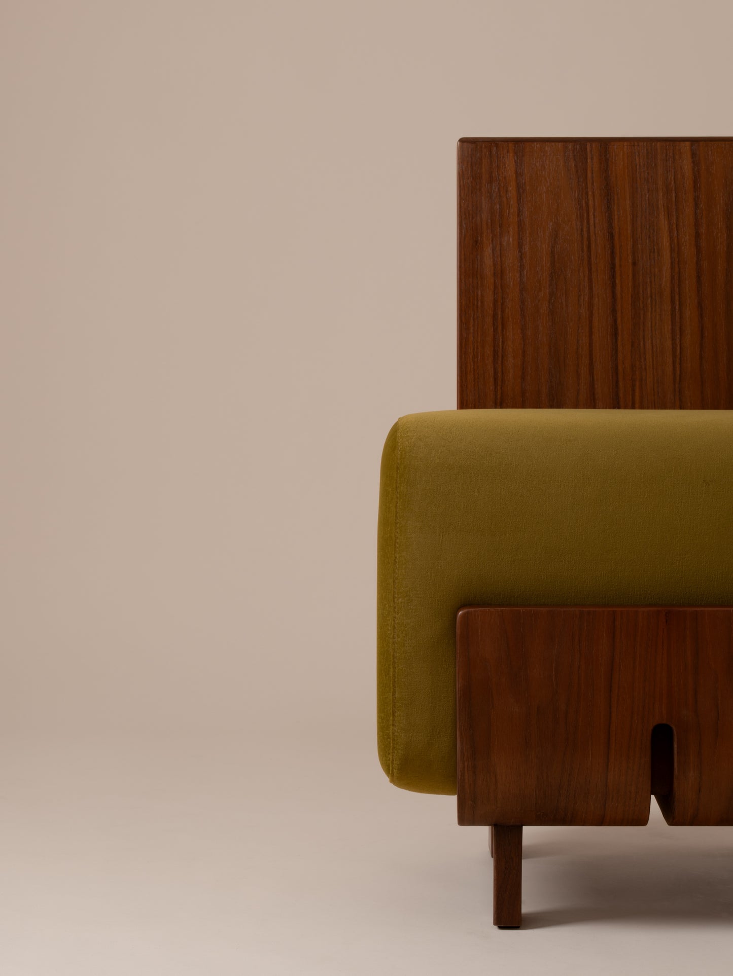 Close-up front view of Moment 2.5 Onigi Chair in luxurious olive green velvet with walnut frame