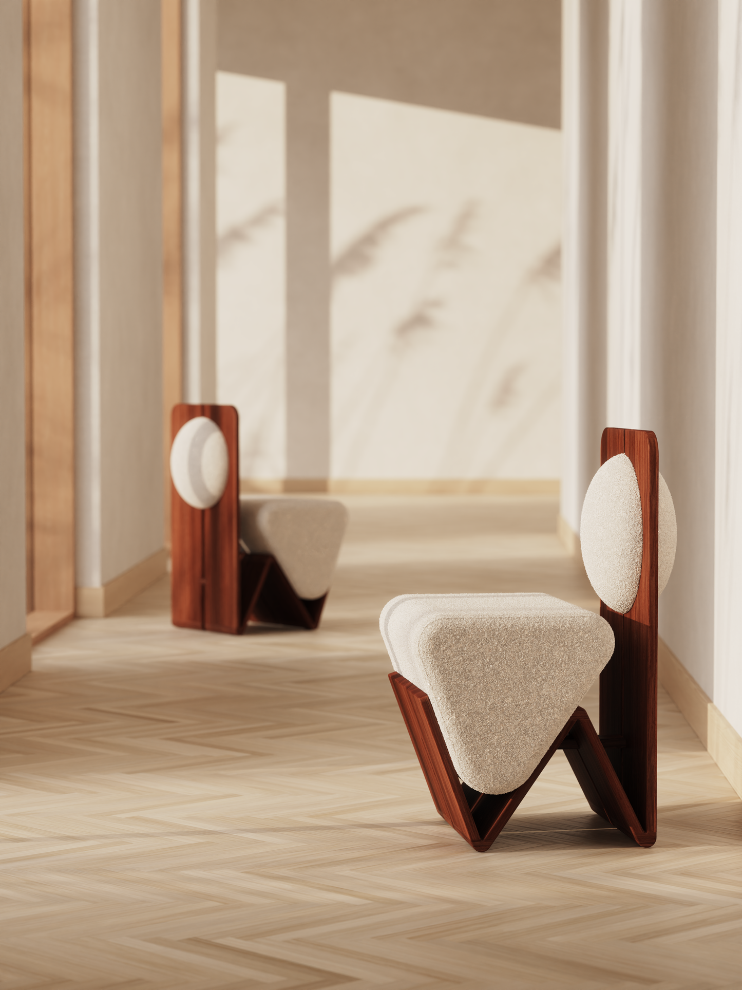 Two Moment 2.5 W Chairs in modern hallway setting, cream bouclé upholstery and walnut frames